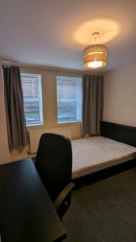 Photo 1: Bedroom - double bed and windows view