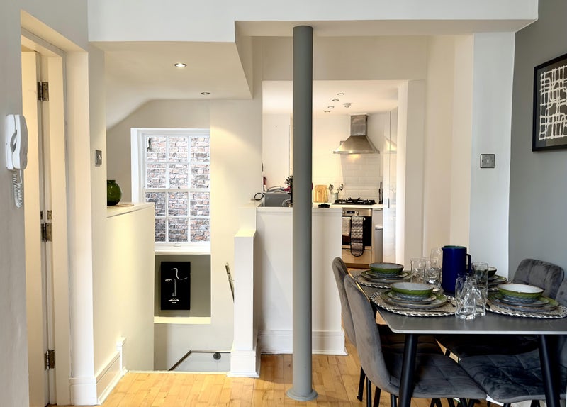 Photo 1: Kitchen- Dining area