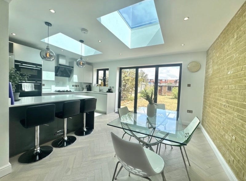 Photo 1: Open plan kitchen 