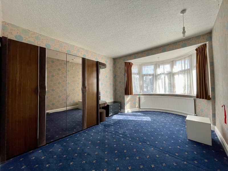 Photo 1: Front Room: Large double room, with storage