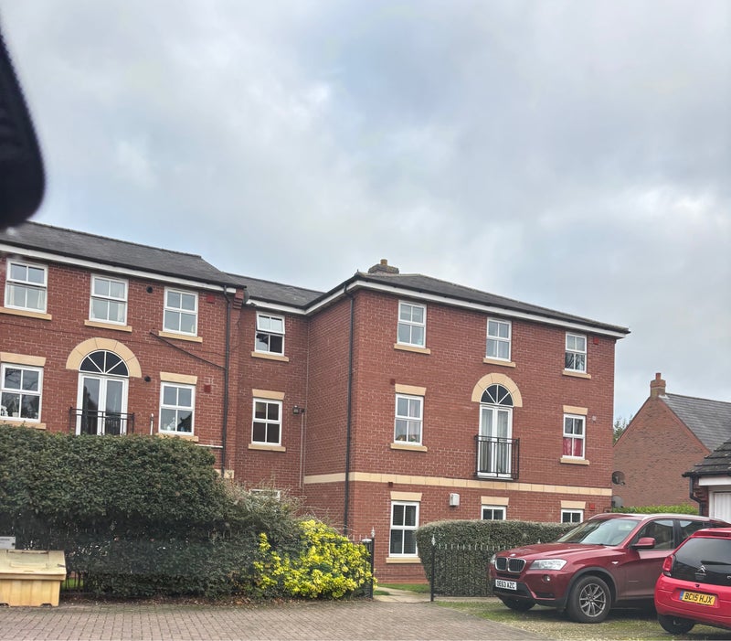 Photo 1: Building (top floor right side of of building 