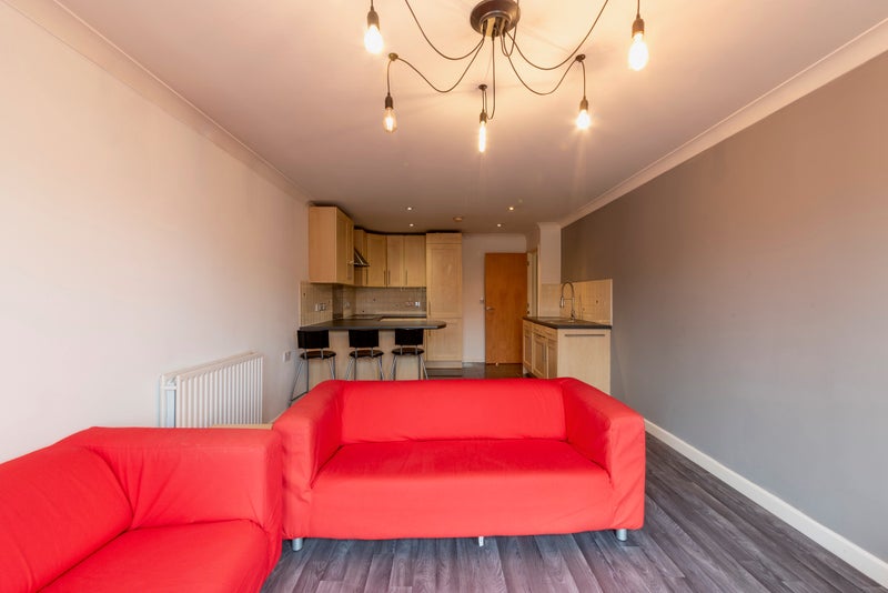 Photo 1: Living room tv included and coffee table