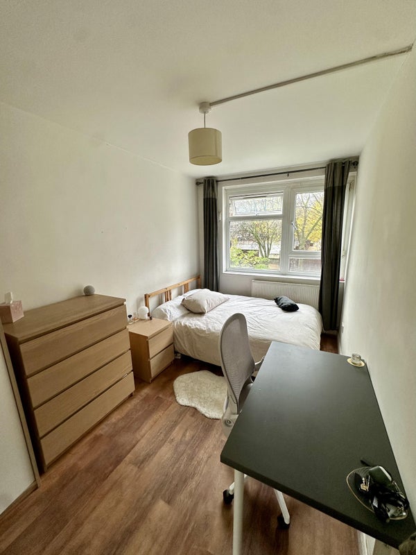Photo 1: Bedroom with bright and big window with a park view.