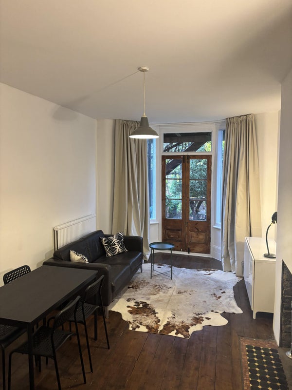 Photo 1: Private living room with high ceilings and French doors to 90ft garden