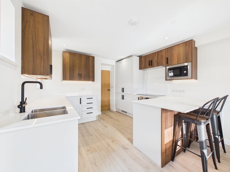 Photo 1: Communal kitchen