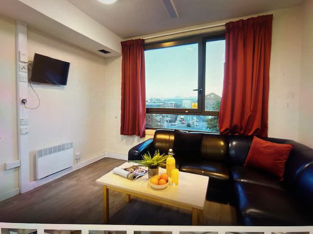 Photo 1: shared living area