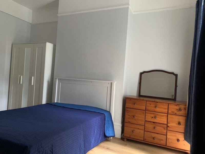 Photo 1: Back Bedroom