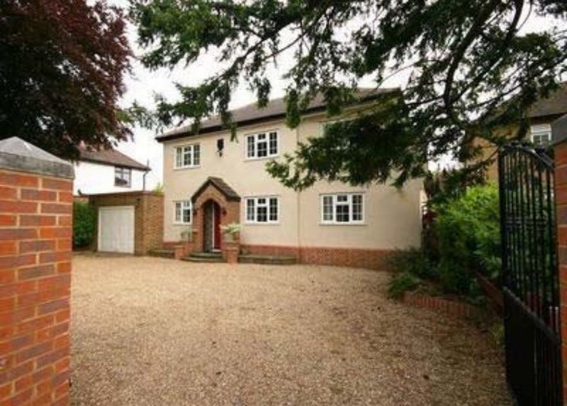 Photo 1: Large parking space at front of house