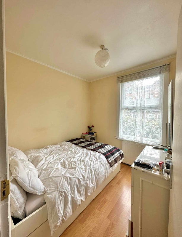 Photo 1: bedroom front view