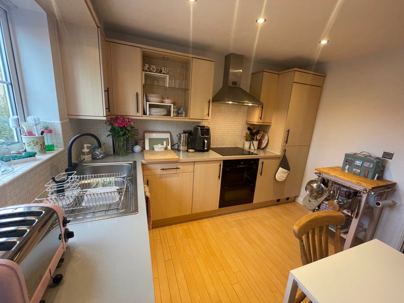 Photo 1: Kitchen with new induction hob, oven and fridge-freezer