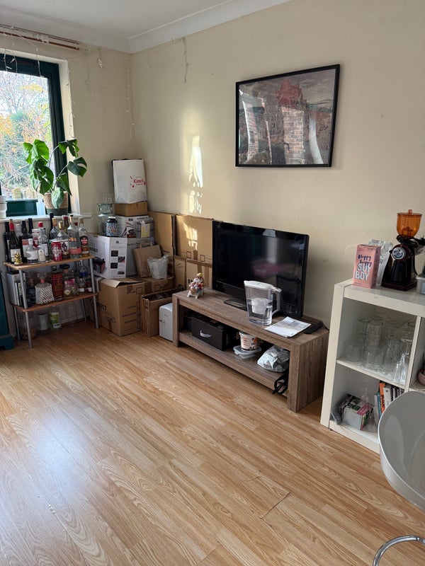 Photo 1: Bright Living Room