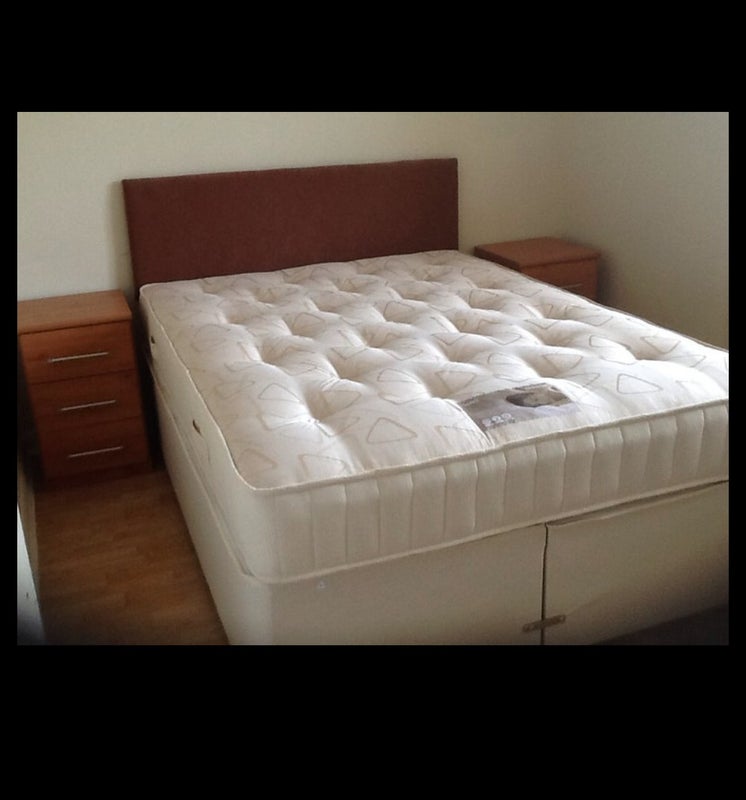 Photo 1:  Double bed.