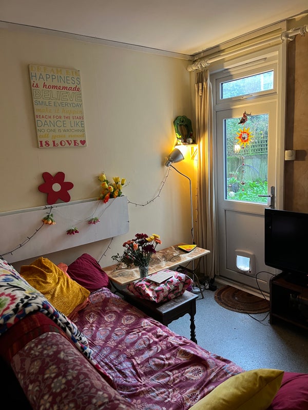 Photo 1: LShared living room space thats attached to the kitchen