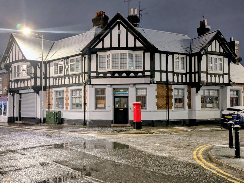 Photo 1: Exterior of building