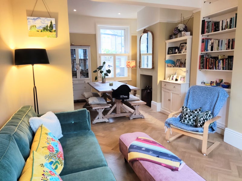 Photo 1: Open plan living/dining room with oak parquet floors. Dining table, benches and sofa included 