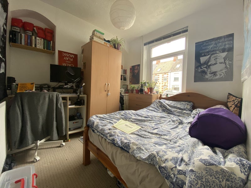 Photo 1: Front bedroom 