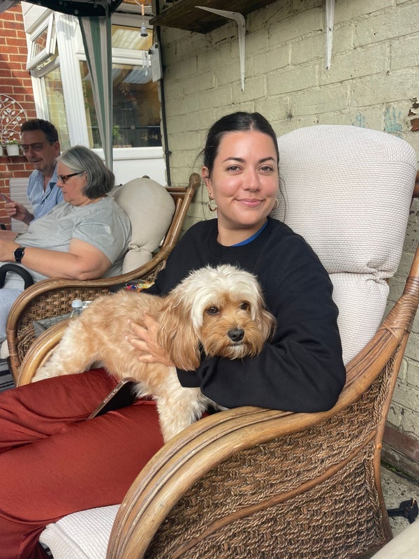 Photo 1: Not my dog, but love cuddling her 😍