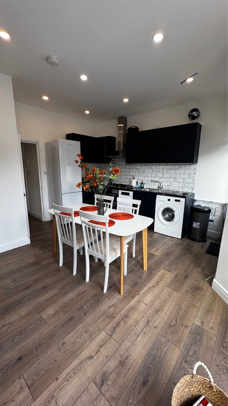 Photo 1: Kitchen diner with sofa bed, dishwasher, washing machine and free cleaning products