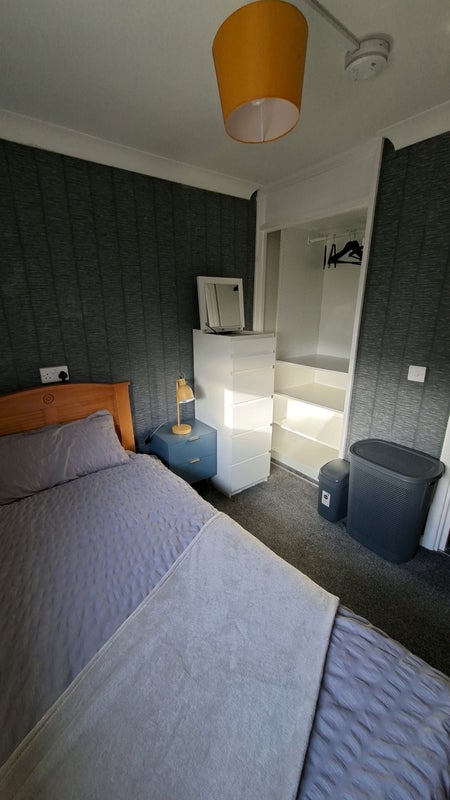 Photo 1: Single room, smart T.V, wardrobe , chest of drawers with mirror,  laundry basket , side table & Lamp