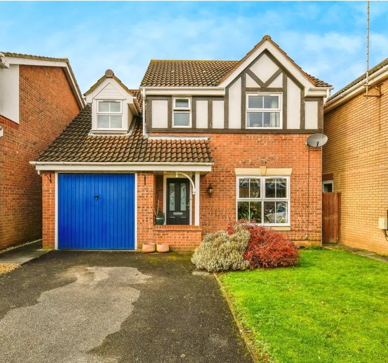 Photo 1: The house with driveway for 2 cars