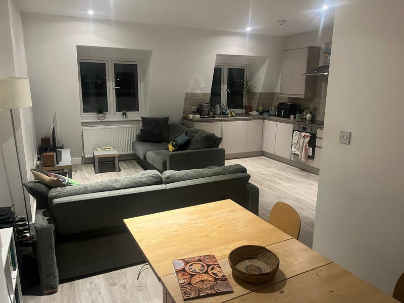 Photo 1: Living Area/ Kitchen