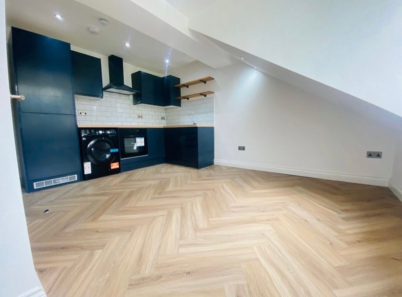 Photo 1: Kitchen/ Living Room