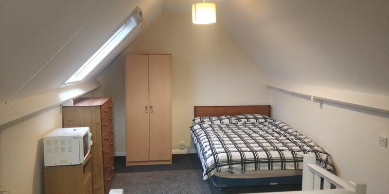 Photo 1: Attic Bedroom