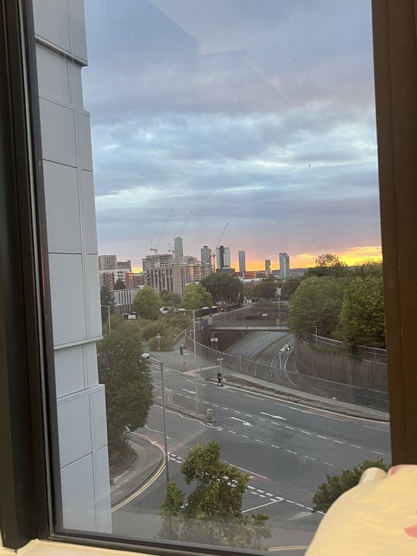 Photo 1: City view from the bedroom