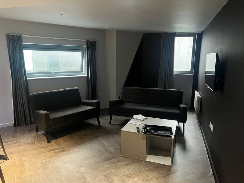 Photo 1: Shared living room