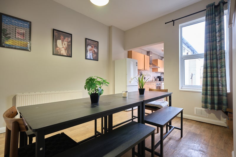 Photo 1: Dining and Living Area