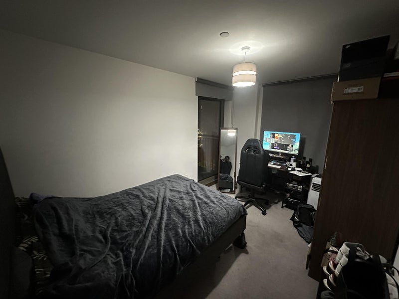 Photo 1: Room with personal furnishings and landlord furnishsings