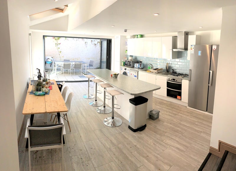 Photo 1: Large shared kitchen with an island
