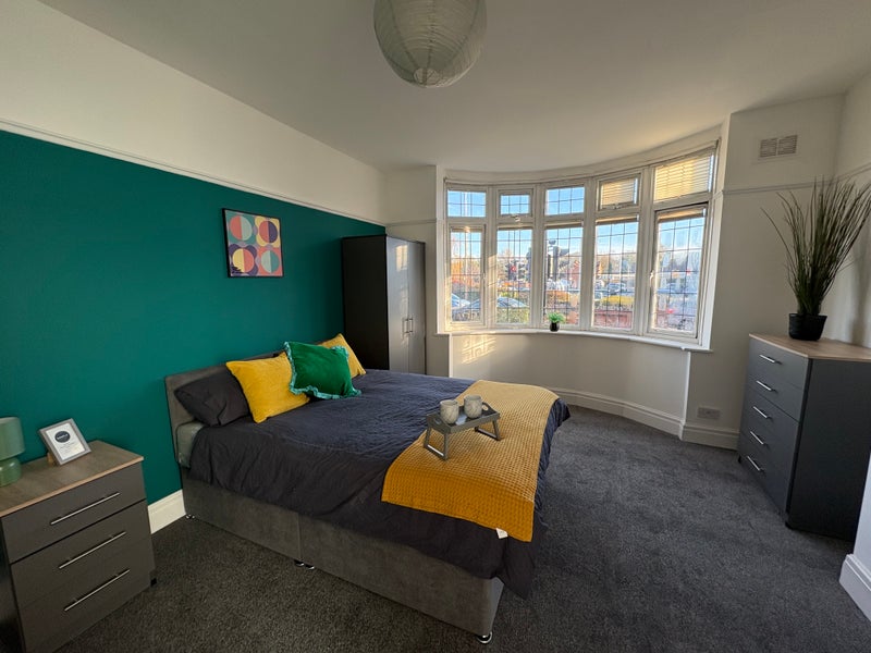 Photo 1: Downstairs bedroom