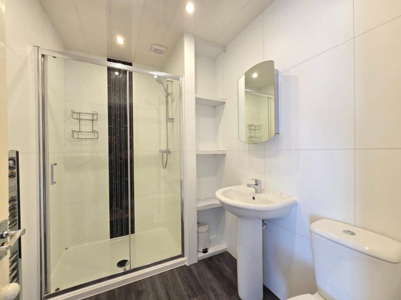 Photo 1: Shared Bathroom