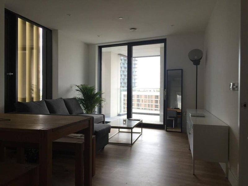 Photo 1: Open living room with balcony