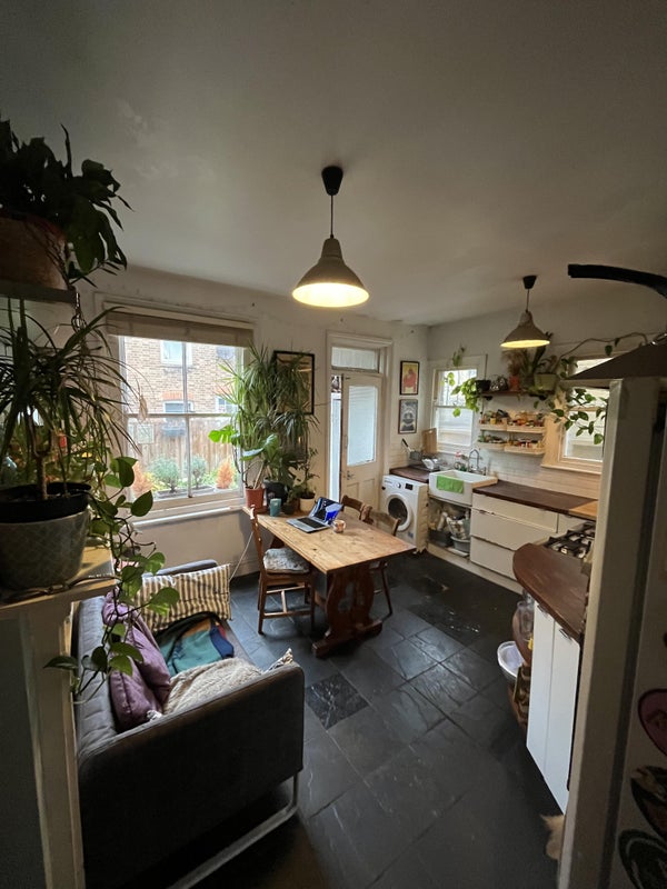 Photo 1: Communal kitchen/dining room