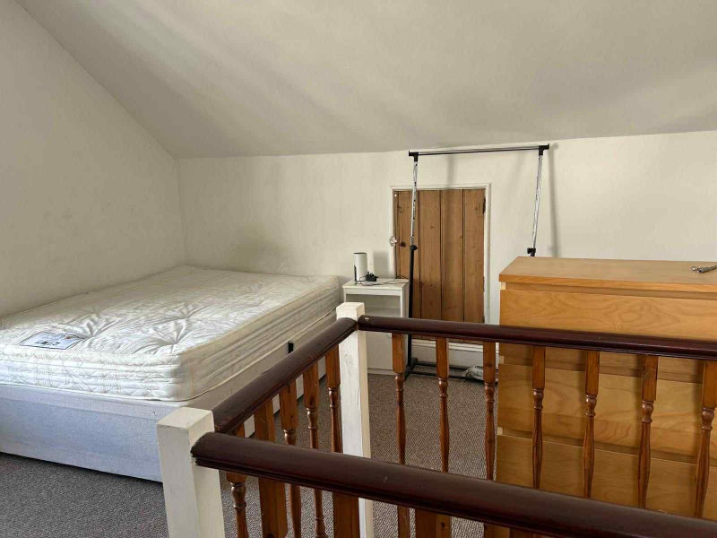 Photo 1: ATTIC BEDROOM AREA