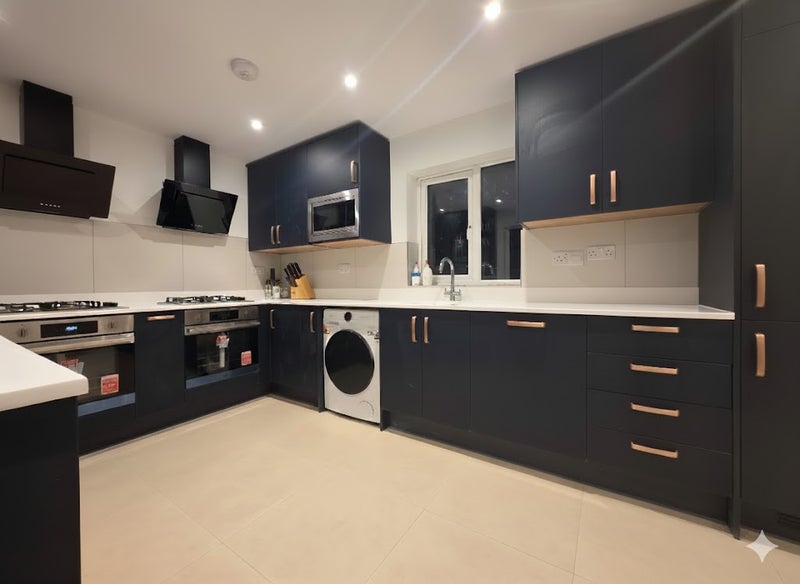 Photo 1: Communal kitchen - 2 x oven 2 x hobs 2 x washer/dryer 2 x Fridge/freezers 