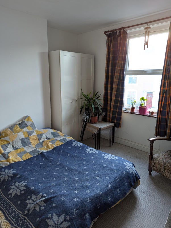 Photo 1: Bedroom, cupboard (chairs, plants, bikes etc will all be moved)