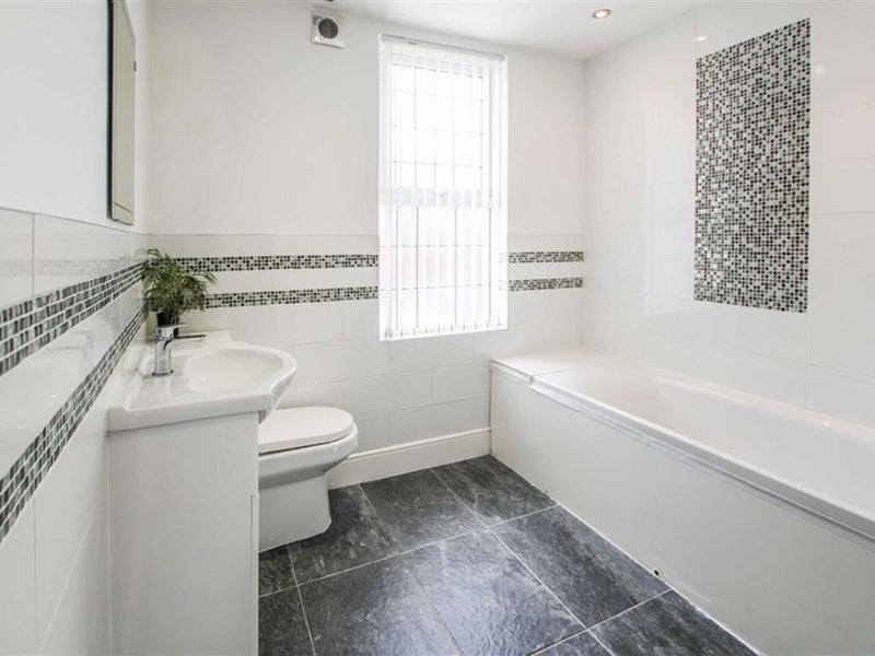 Photo 1: Shared bathroom - bath and shower 