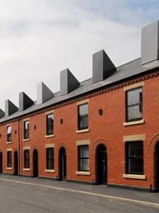 Photo 1: View of the street 