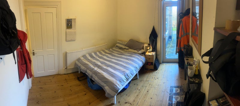 Photo 1: Smaller Room