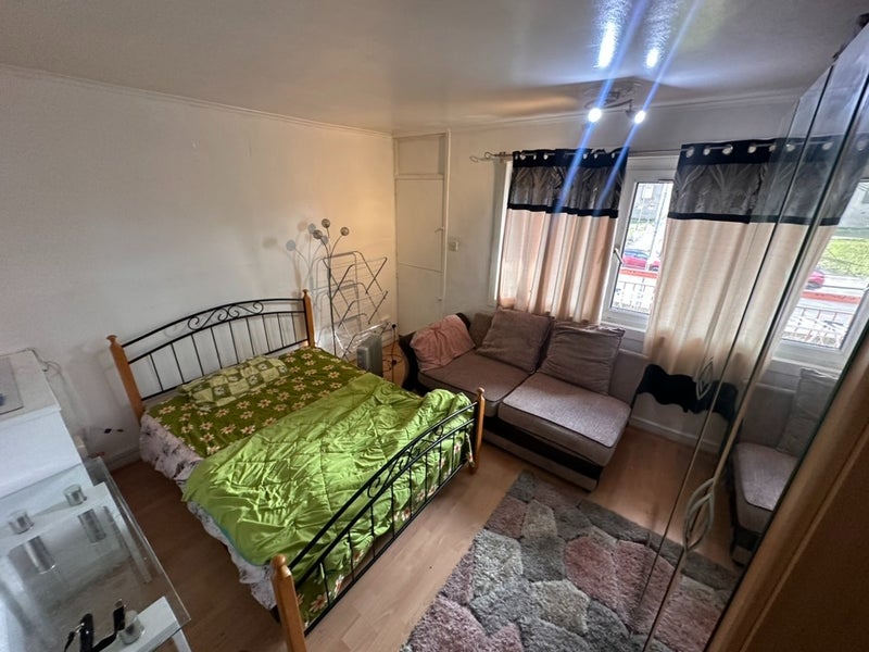 Photo 1: Room with sofa