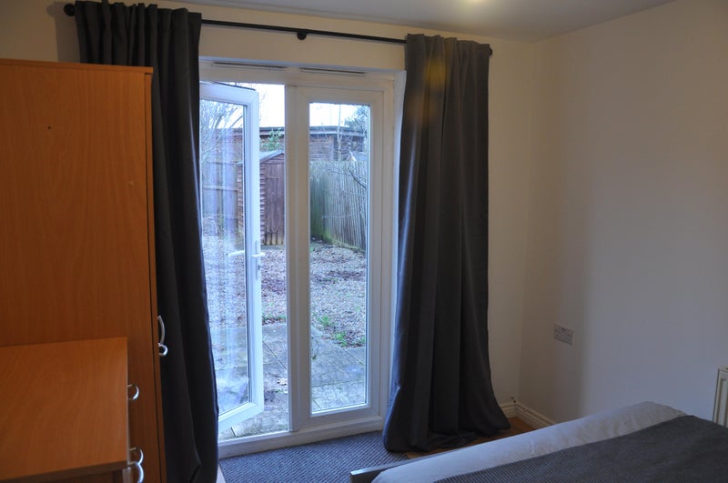 Photo 1: Bedroom 1 - ground floor with garden access