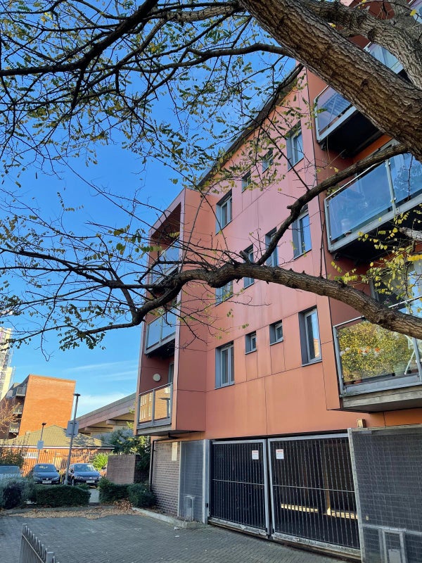 Photo 1: Building / Parking