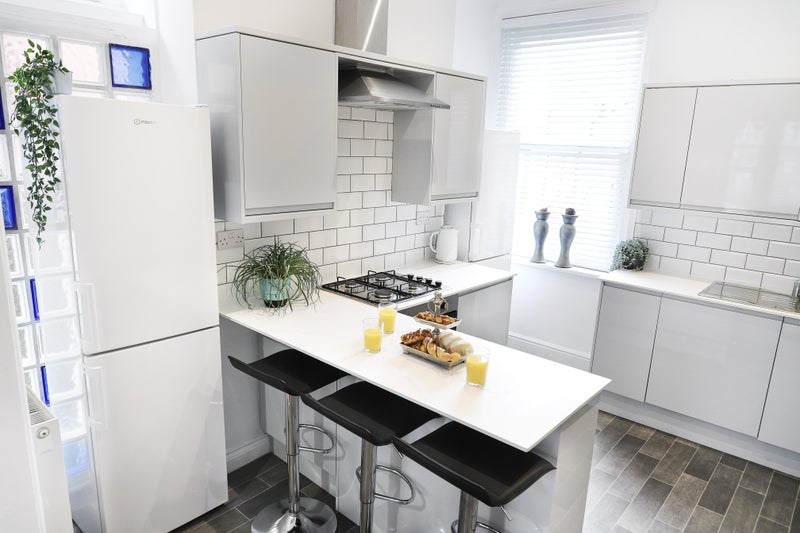 Photo 1: The open plan kitchen/diner is great for socialising