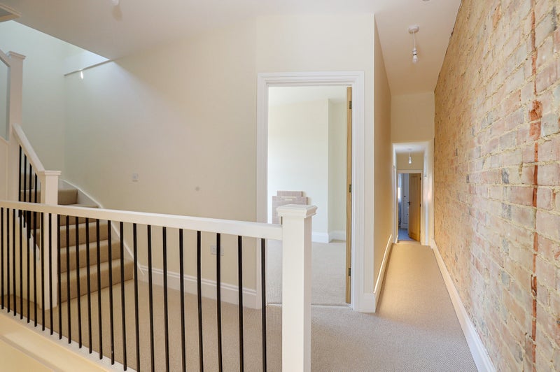 Photo 1: Exposed Brick Design