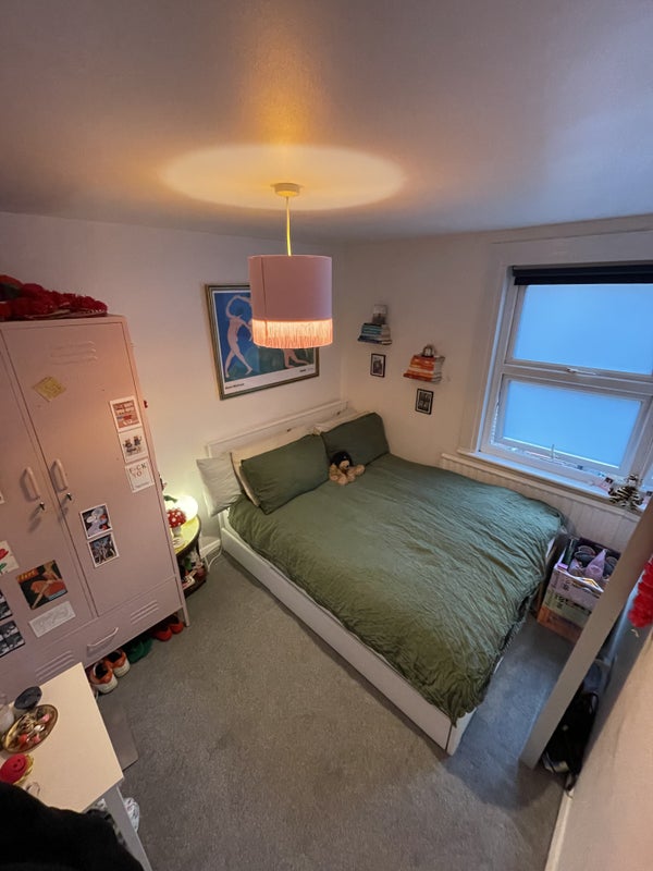 Photo 1: This is the available double room. Standard double with storage beneath bed.