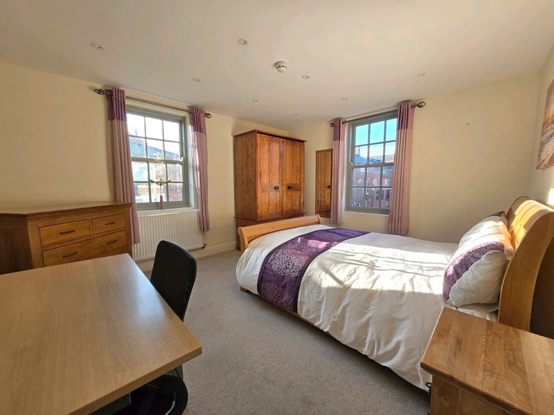 Photo 1: Spacious double room with two large windows and plenty of natural light.