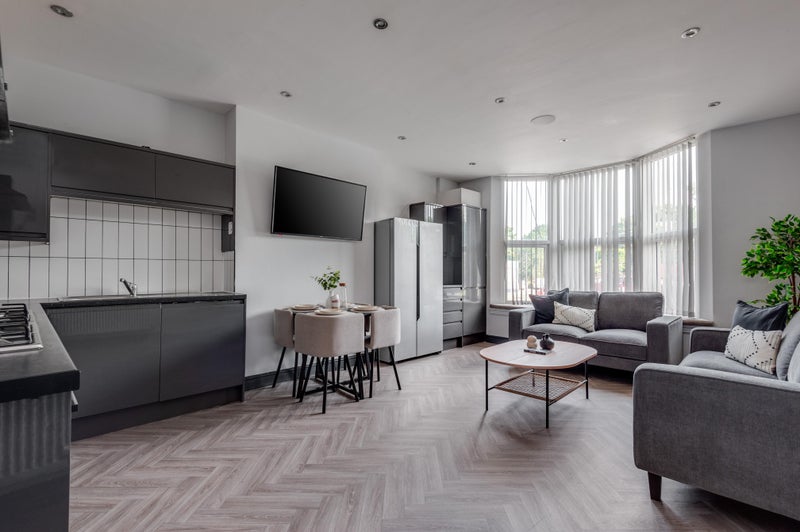 Photo 1: Kitchen/Living Room